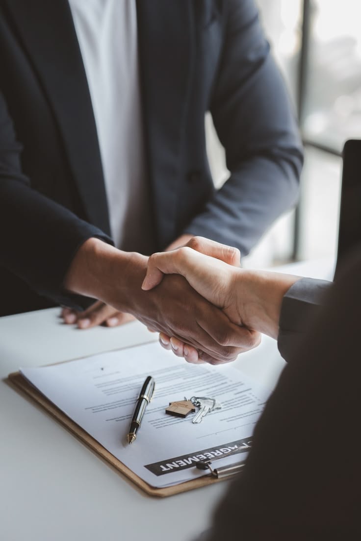 A handshake sealing a successful partnership agreement